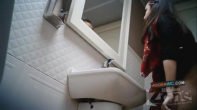 Hidden camera footage in the women's restroom (1)
