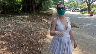 Public nudity: a girl from Russia tries to take her clothes off in the streets of Rio de Janeiro. She almost got arrested.